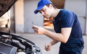 Mechanic-Checking-Oil-Level-800x500-1
